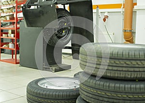 Tire service.Balancing the wheels of the car in the workshop