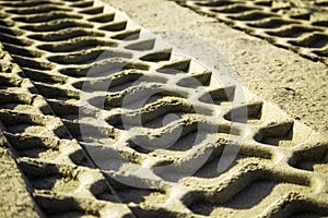 Tire track in the sand photo