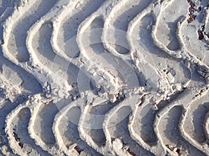 Tire track in snow, tread, dirty snow