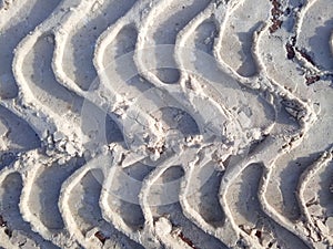 Tire track in snow, tread, dirty snow