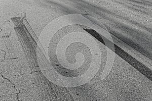 Tire tracks on a asphalt road