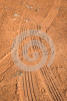 Tire tracks on dirt ground