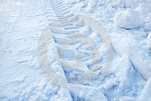 Tire tracks in fresh fallen snow