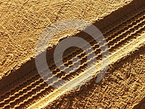 Tire Tracks in Sand