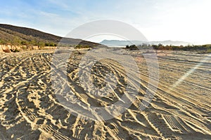 Tire tracks in sandy beach road Baja California Sur, Mexico