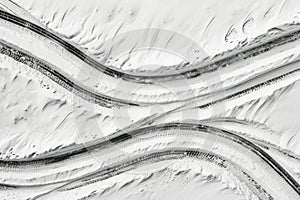 Tire tracks on a snow-covered road. Winter landscape.