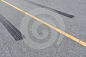 Tire tracks , Wheel trace on asphalt road