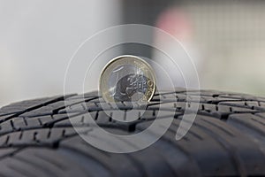 Tire Tread with a 1 Euro Cion