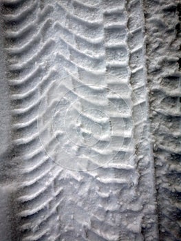 tire tread on snow falling shade texture