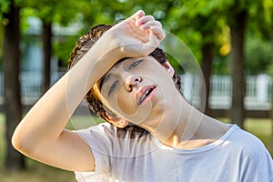 Tired Acne teenager with braces