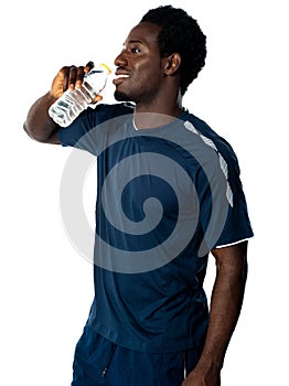 Tired african athlete drinking water