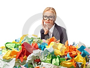 Tired attractive blond secretary with a lot of papers