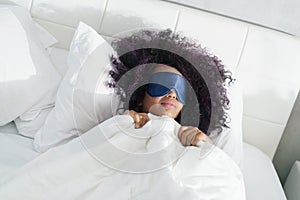 Tired Black Girl Waking Up In Bed With Sleep Mask