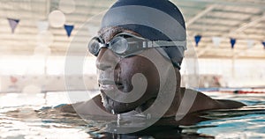 Tired, black man and sport with face in swimming pool for cardio workout and endurance practice for race or competition