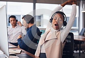 Tired black woman, yawning and stretching in call center for break in customer services or desktop support at office