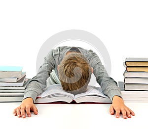Tired and bored boy with books