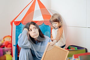 Tired Bored Mom Having No More Energy in the Playroom