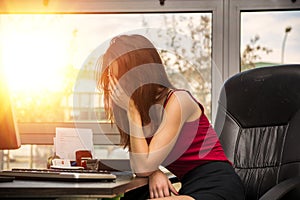 Tired bored sleepy young female office worker