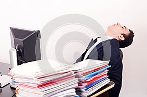 Tired business man sleeping at work.