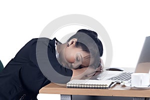 Tired business woman sleeping at her desk.