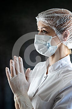 tired caucasian female doctor are praying at the hospital