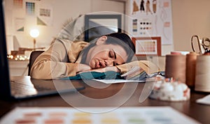 Tired, design and woman in fashion sleeping at a desk with burnout, stress and creative work in boutique at night