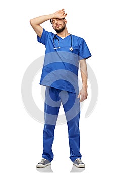 tired doctor or male nurse with stethoscope