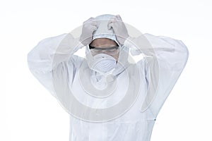 Tired doctor with protective clothing because of coronavirus