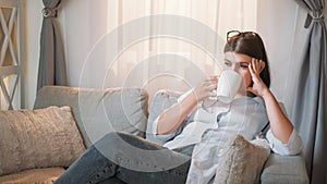 Tired doctor resting nurse woman coffee relaxing