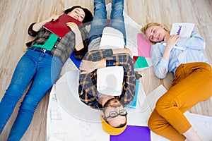 Tired employees sleeping