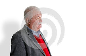Tired exhausted senior man over a white background
