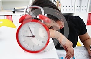 Tired and exhausted woman have a lot of work with documents fall asleep