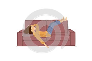 Tired exhausted woman lying resting relaxing legs up on couch sofa isolated