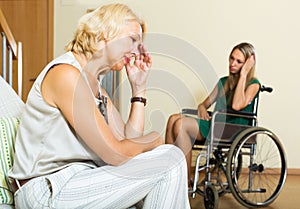 Tired female and disabled person