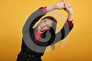 Tired Female Stretches Her Hands To Side. Fatigue At Work, Stress, Sleepiness