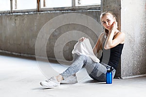 Tired Fit Girl With Towel Resting After Exercising