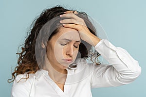 Tired frustrated business woman office worker sighing wiping sweat of forehead has emotional burnout