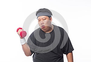 Tired funny fat asian man in sport outfits exercising with dumbbell and looking to camera isolated on white background.