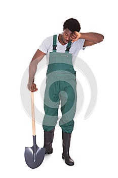 Tired Gardener With Shovel