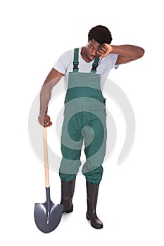 Tired Gardener With Shovel photo