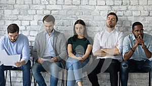 Tired job candidates waiting for interview far too long