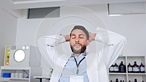 Tired male scientist disappointed in medical job, frustrated about work load. Medical scientist in workplace feeling