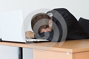 Tired Office Man Take Rest In Front His Computer photo