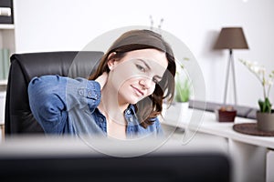 Tired Office Woman Holding Back of her Neck