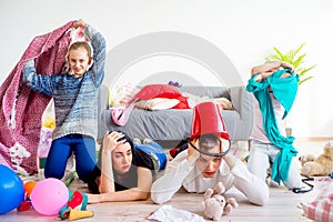 Tired parents and romping kids