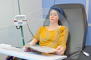 Tired patient having chemo session photo