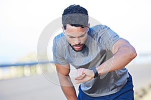 Tired runner, fitness training and man health check on smart watch. Sports athlete training, healthy lifestyle exercise
