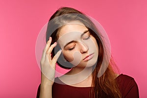 Tired sad young woman sleepy drowsy exhausted photo