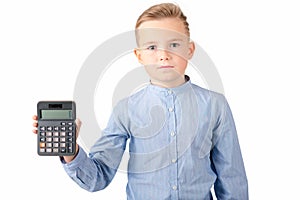 Tired Schoolboy holding calculator. Portrait of funny cute 10s boy .White background