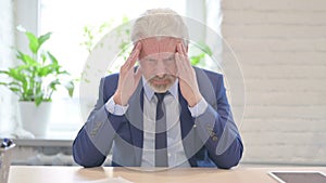 Tired Senior Old Businessman with Headache in Office, Migraine